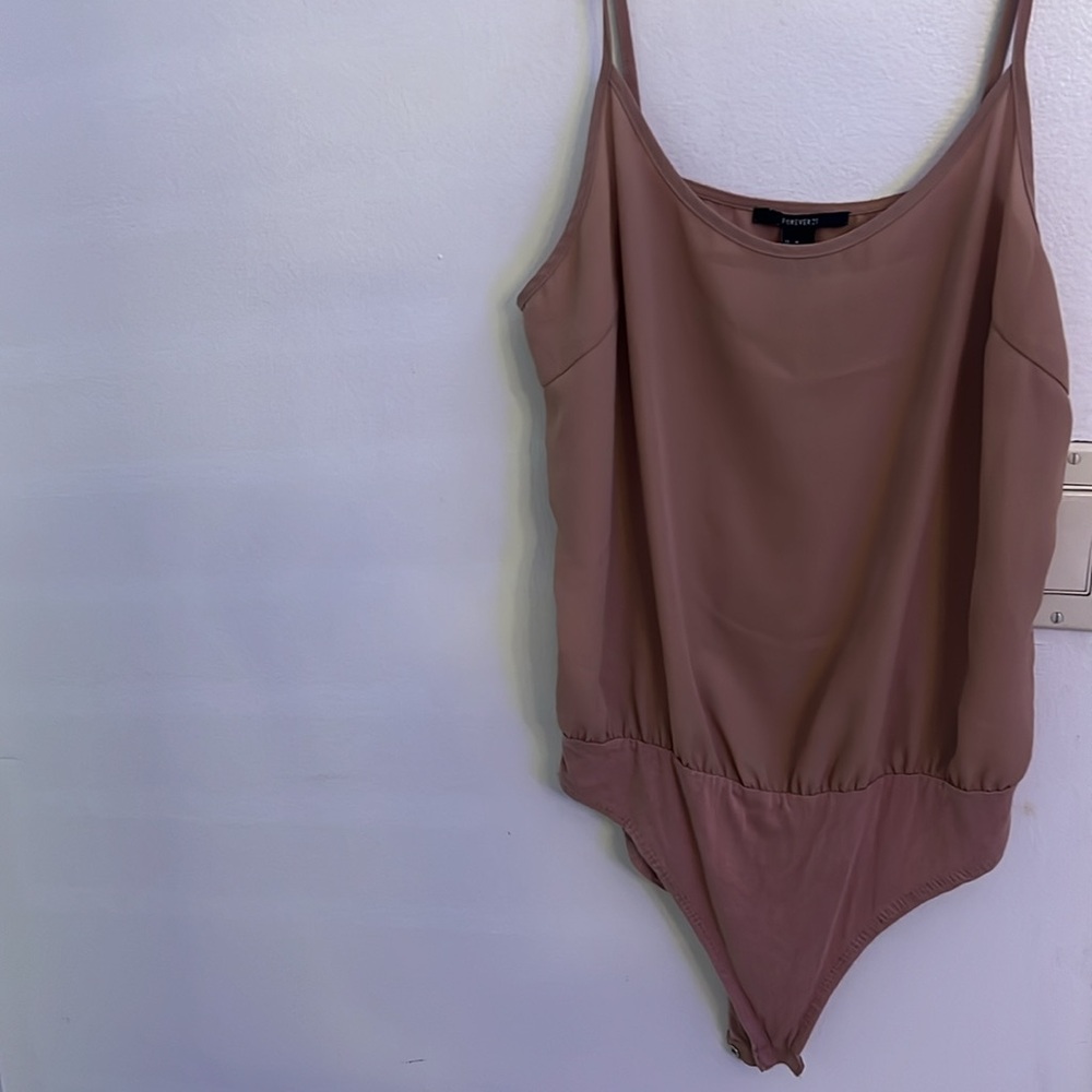 Taupe colored body suit